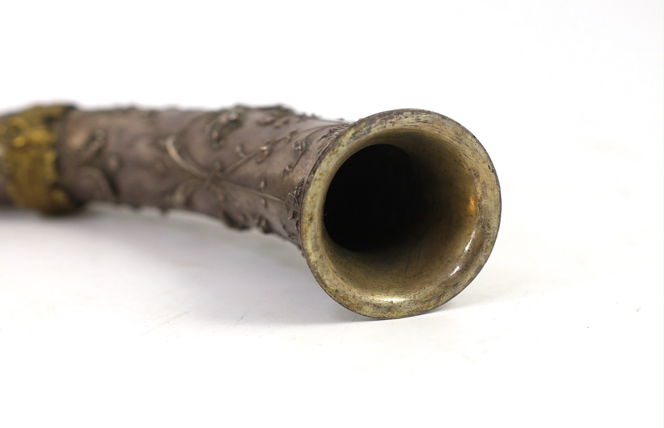 A 19th century Italian white metal hunting horn, length 40cm, depth 26cm